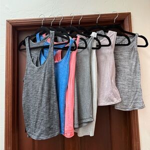 Lululemon workout tank tops, all size 4 or 6. All 7 for $80 total